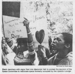 During University Day 1976, students protest the reallocation of Upendo Lounge in Chase Hall. (Photo appeared in October 13, 1976 edition of The Daily Tar Heel.)